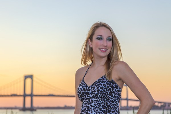 My subject lives in the shadow of this bridge, and is most definitely a New Yorker.  This was an impromptu session after a private tutoring session and she was reluctant to let me point the camera at her. She wanted to learn photography herself, so I wrapped a lesson into the banter and pretty soon she was just talking photography and forgetting I was snapping images.  EOS 5D Mark II with EF 70-200 f/2.8L IS II. 1/200 @ f/4; ISO 100.