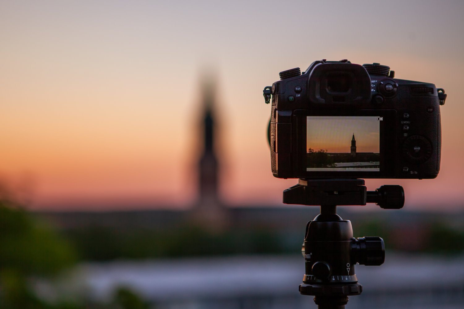 camera photographing a building